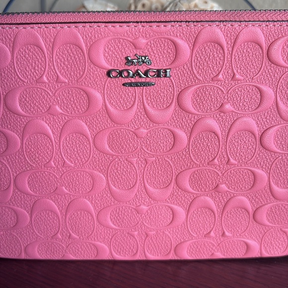Coach Embossed Pink Wristlet - Picture 2 of 10